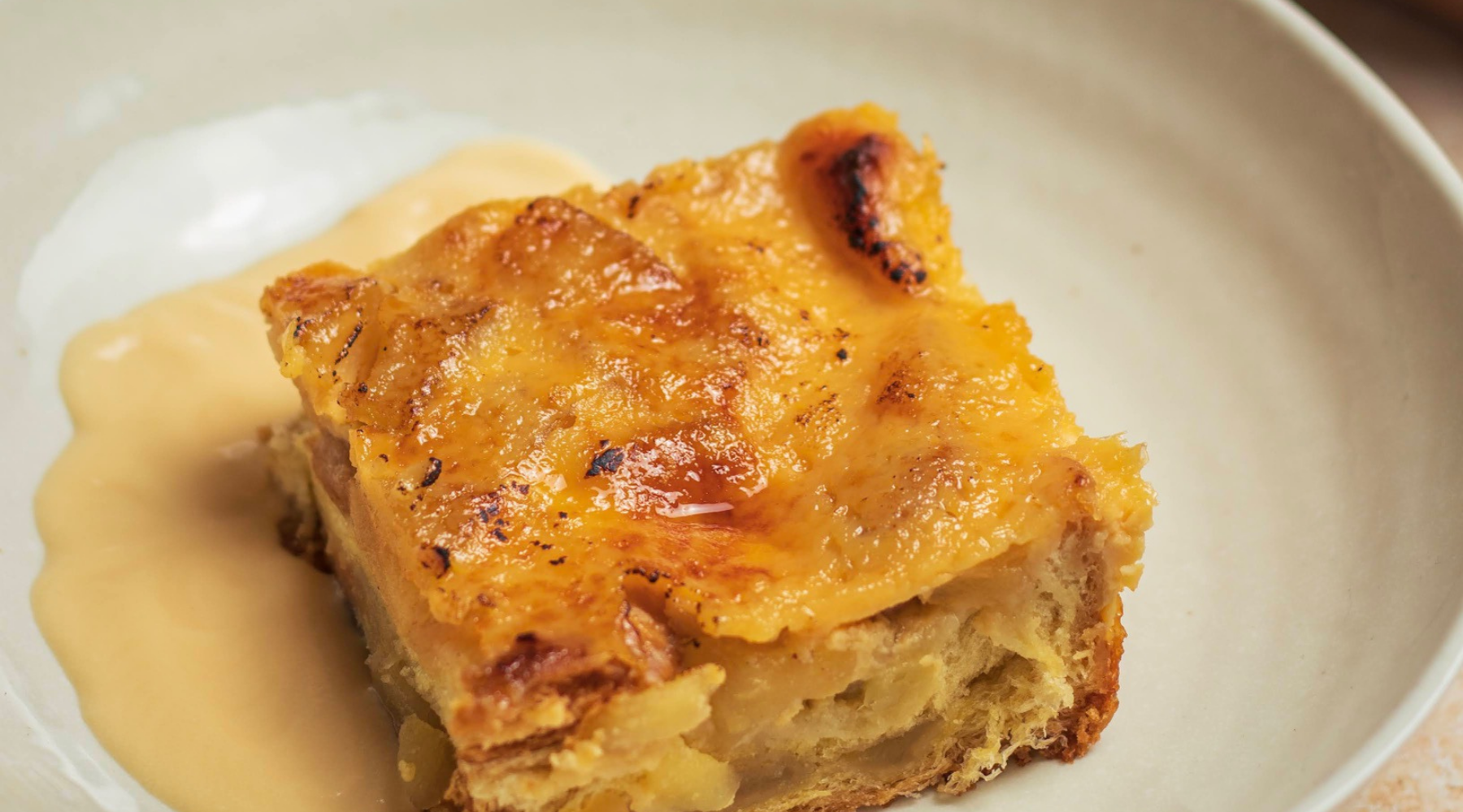 Caramelised Apple & Bourbon Custard Brioche Pudding